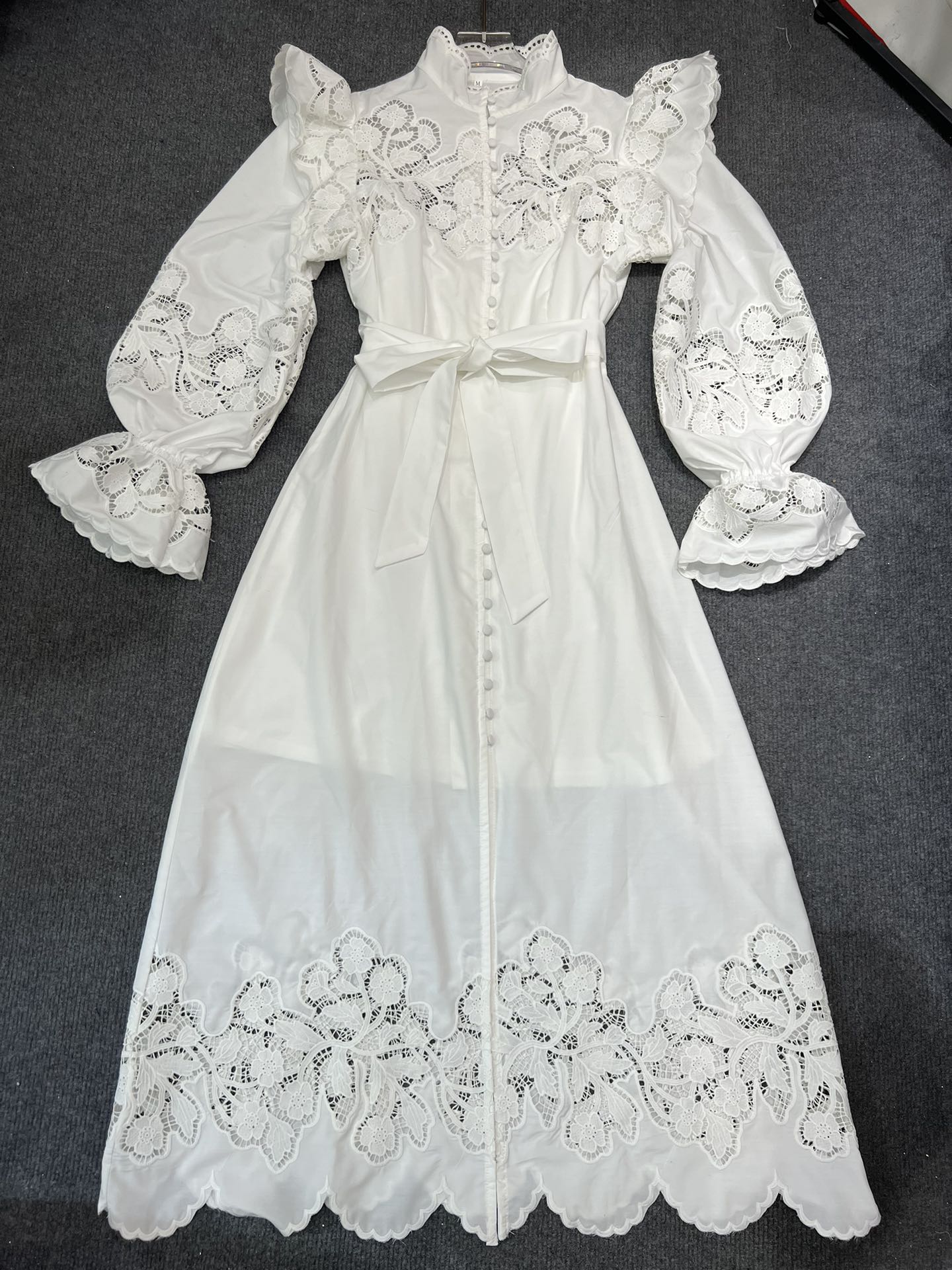 Designer dress with hollowed out embroidery and ruffled edges for a slim waist long sleeved holiday dress