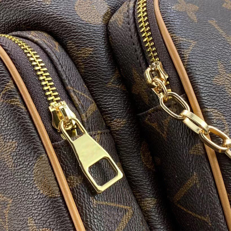 Sac à dos design femme classique grande capacité sac de voyage de luxe sacs polochons pour hommes et femmes imperméable en cuir chaîne en or bandoulière sac d'école sac à dos