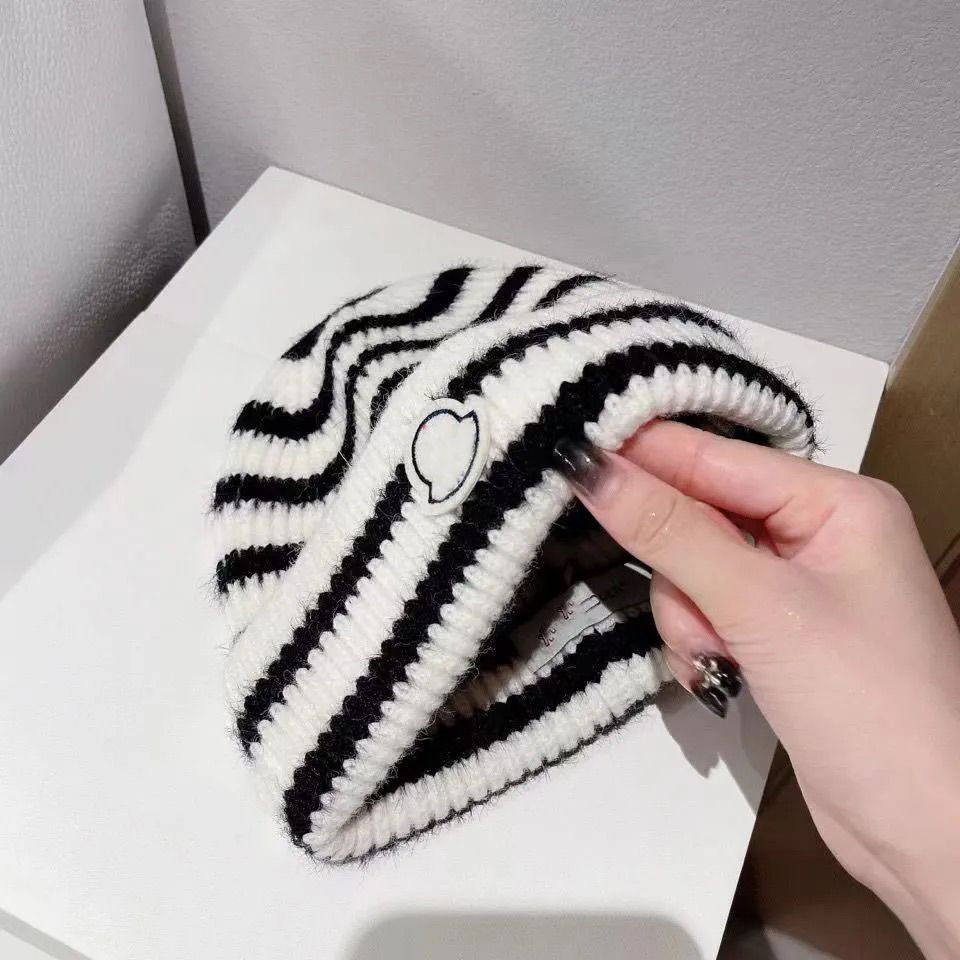 Hot selling zebra wool hat in Europe and America made of pure cotton material and added with acrylic windproof warmth suitable for outdoor