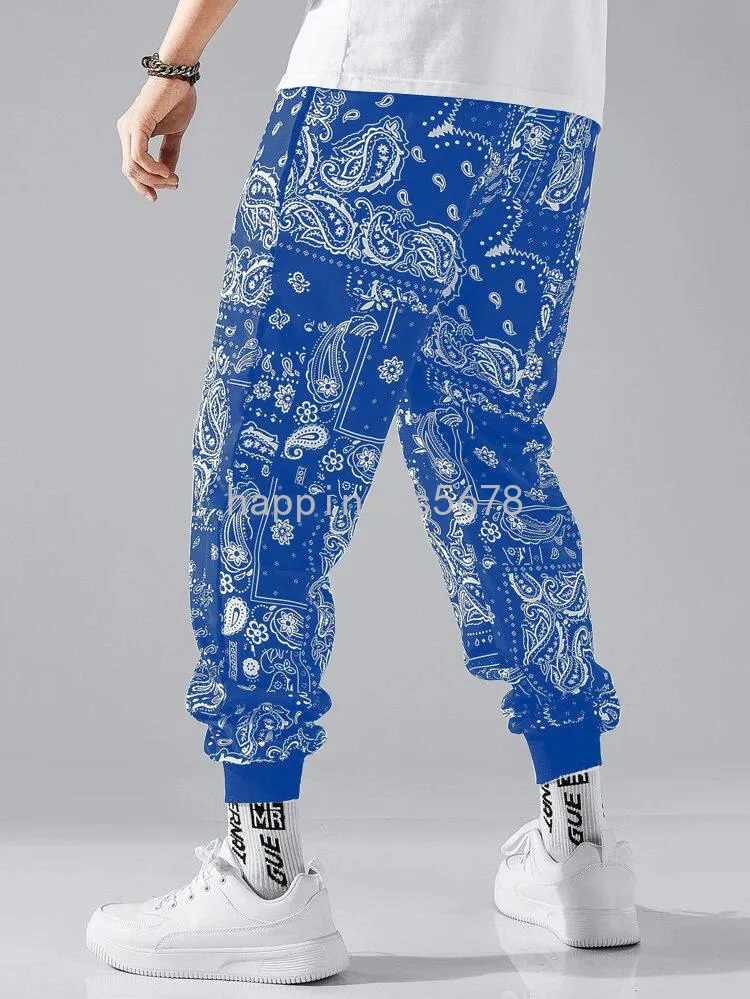 Pantalones para hombres Pantalones de chándal transpirables de malla para hombre Pantalones con estampado de flores de anacardo Tendencia del pie del ramo