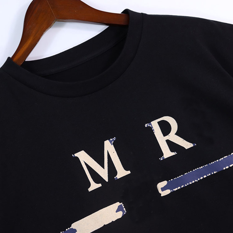 Designer T -skjorta Mens kläder Mens Designer Vintage Flocked Print Mönster Print Kort ärm Mäns och kvinnors jogging tröjor