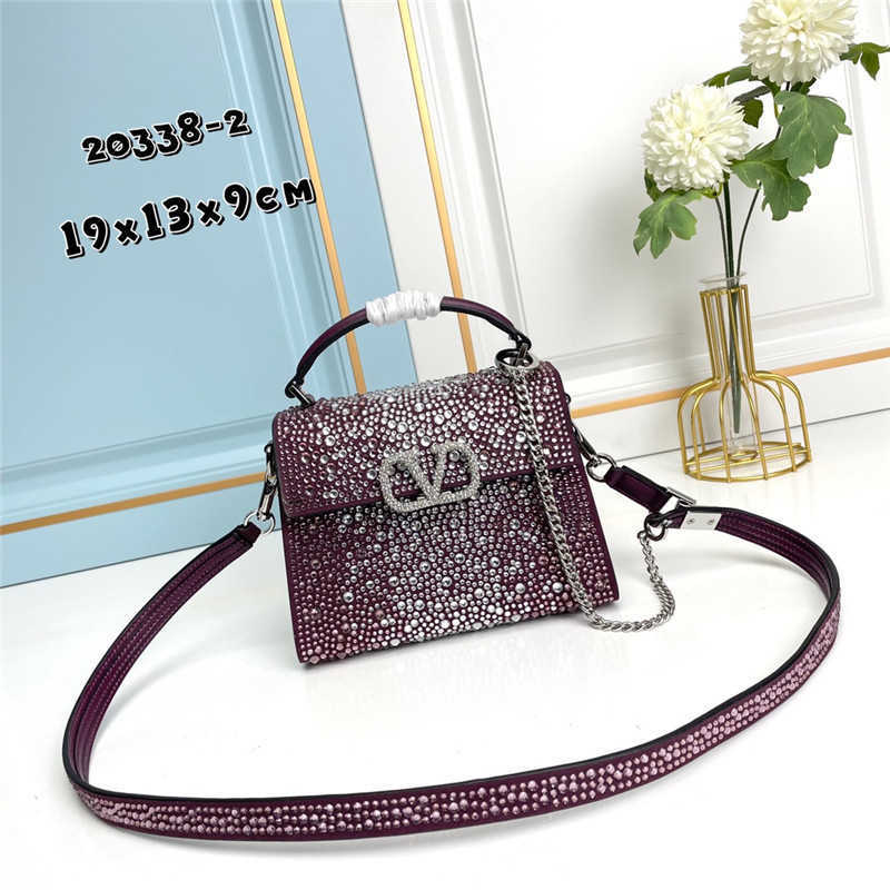 One Cowhide Valenttiino lady Classic New Fashion Leather Chain Miniloco Little Handheld Womens Bags Leather Vbuckle Straddle shoulder Metal V Purse Bag Lady JYXE