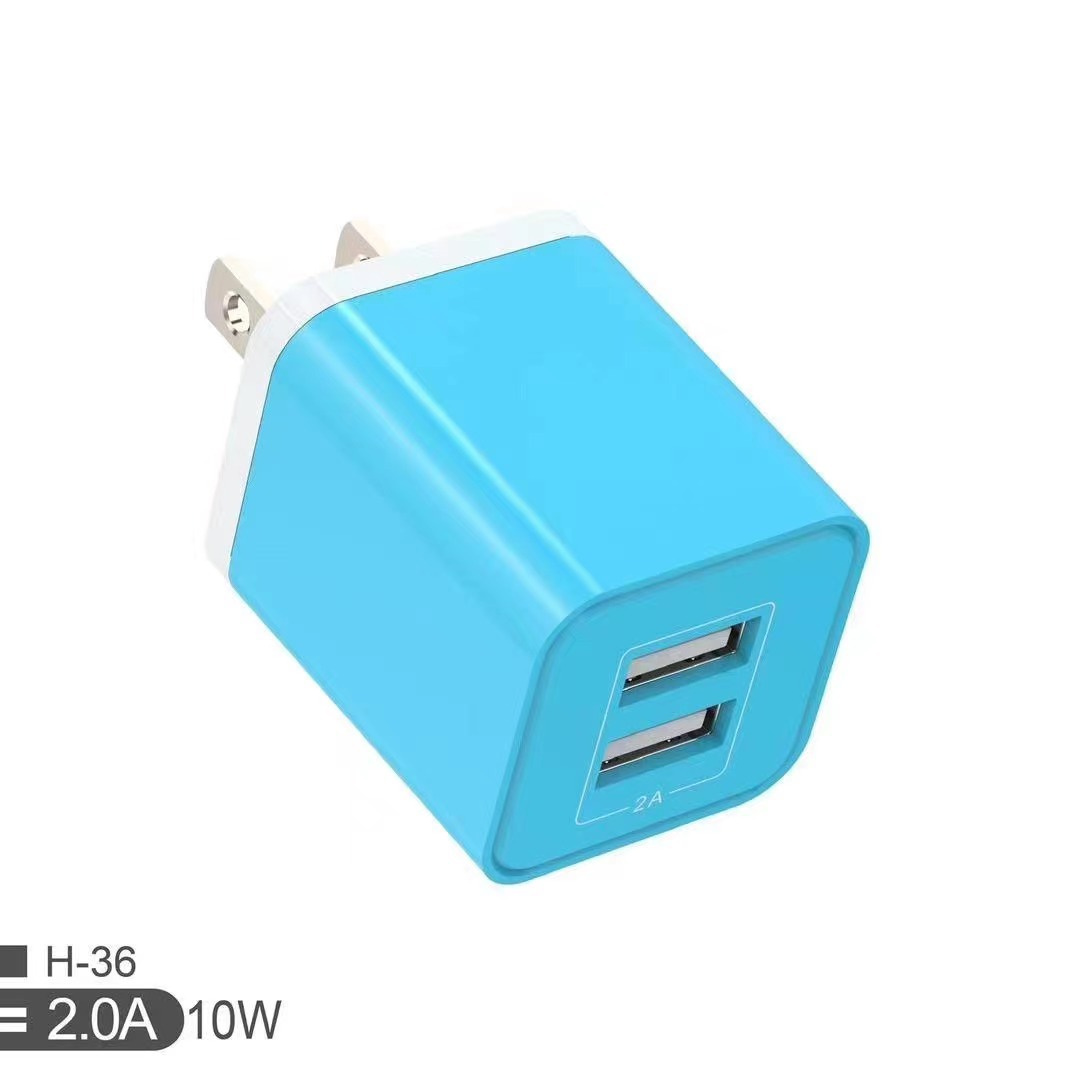 Prezzo diretto di fabbrica Caricatore da muro USB colorato telefono cellulare Caricatore universale 2 porte USB 10W