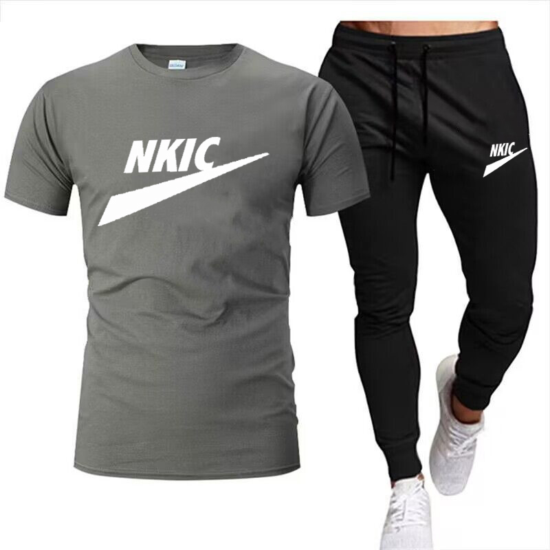 Mężczyznowe dresy drukowane 2 sztuki Tops and Shorts Sportswear Man Ubrania Zestaw stroj