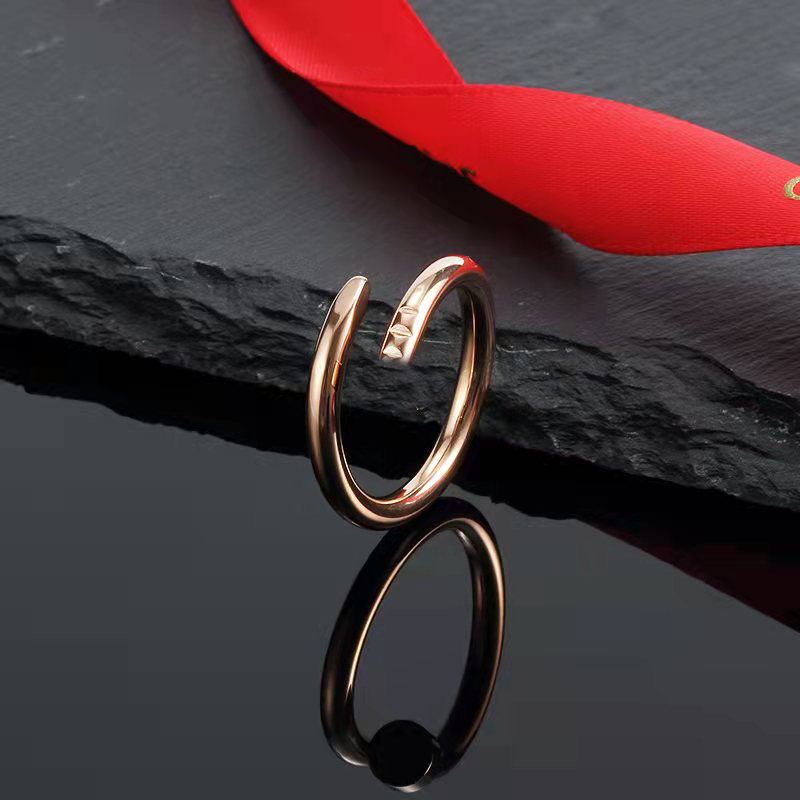 2023 Novo anel de casal de moda de moda de moda de unhas do novo 18k para menu para menwomen clássico de designer de marca rings jóias de aço inoxidável290e