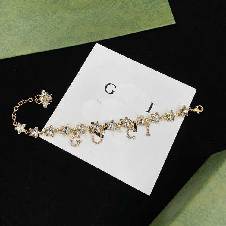 70% de réduction 2023 Nouveaux bijoux de mode de luxe de haute qualité pour pentagramme insecte strass collier bracelet boucles d'oreilles ensemble de conception en laiton