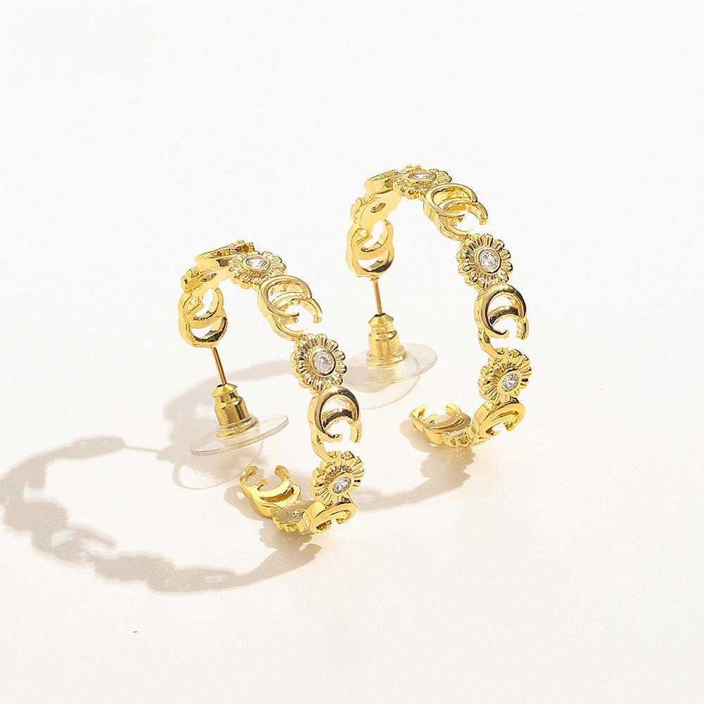 60% DI SCONTO 2023 Nuovi gioielli di moda di alta qualità di lusso orecchini a doppio girasole Orecchini in rame con zircone intarsiato in vero oro placcato in oro con fiore in argento