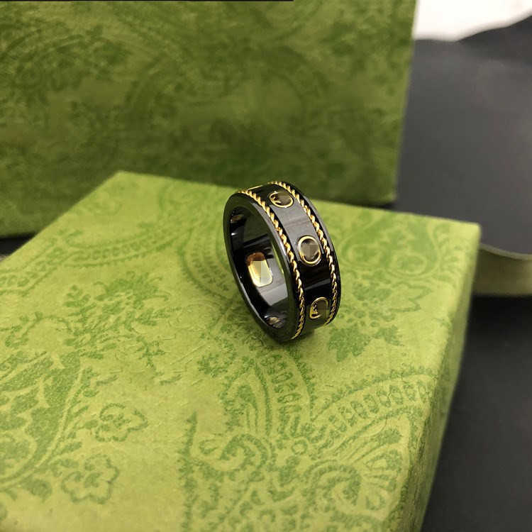 2023 Nouveaux bijoux de mode de luxe de haute qualité pour bague familiale double pierre en céramique blanche en acier noir pour hommes et femmes pour offrir des cadeaux à leurs copines