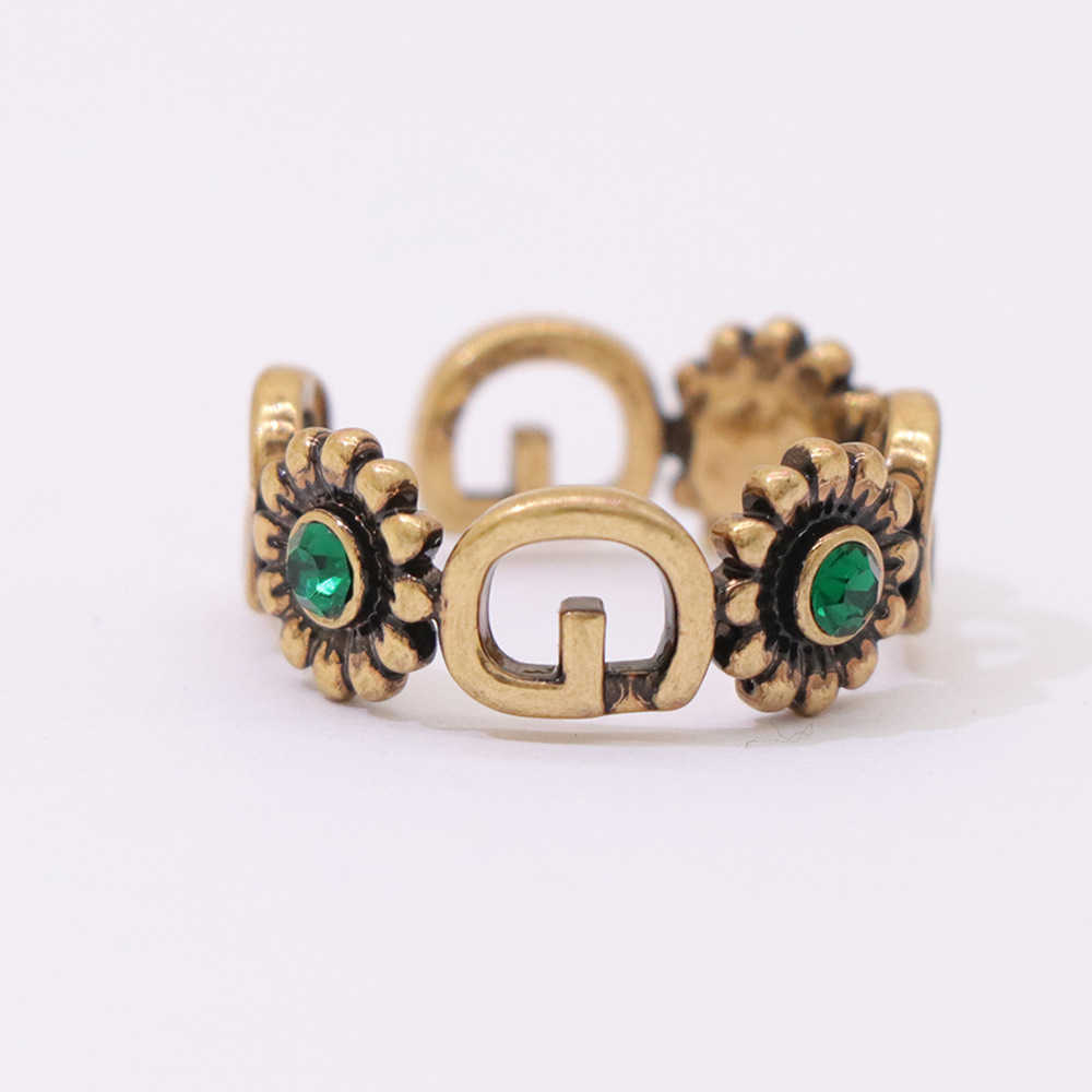 20% OFF 2023 New Luxury High Quality Fashion Jewelry for Summer gift ancient family Ring Emerald with gold hollow out metal texture light extravagant open ring