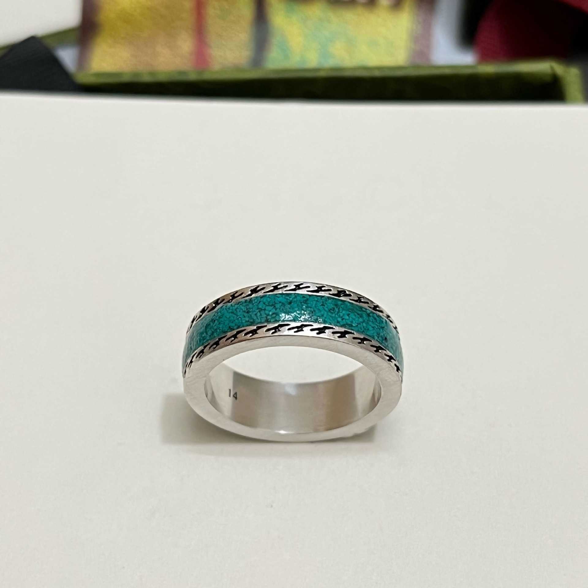 Factory wholesale 2023 New Luxury High Quality Fashion Jewelry for The ancient enamel is decorated with bright green interlocking double woven piping ring