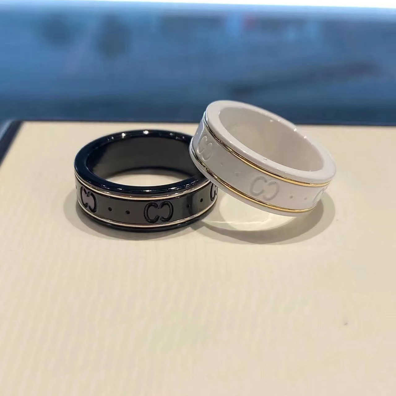 20% OFF 2023 New Luxury High Quality Fashion Jewelry for Double black white ceramic ancient family 18K rose gold bee planet strange men and women's same style couple ring