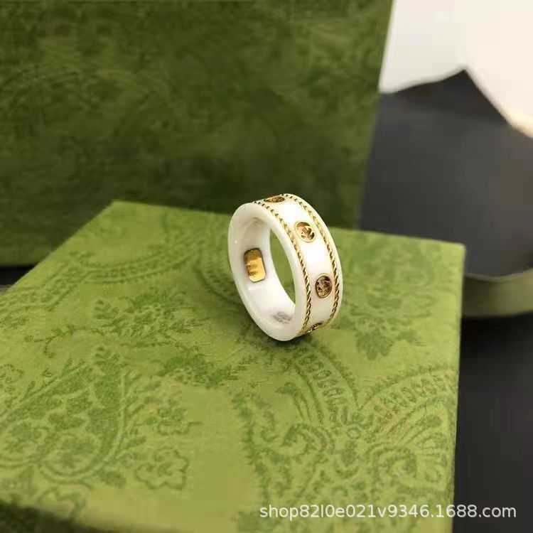 Fashion Collection 2023 New Luxury High Quality Fashion Jewelry for Black and White Ceramic Fried Dough Twists Gold Double Sided Couple Ring