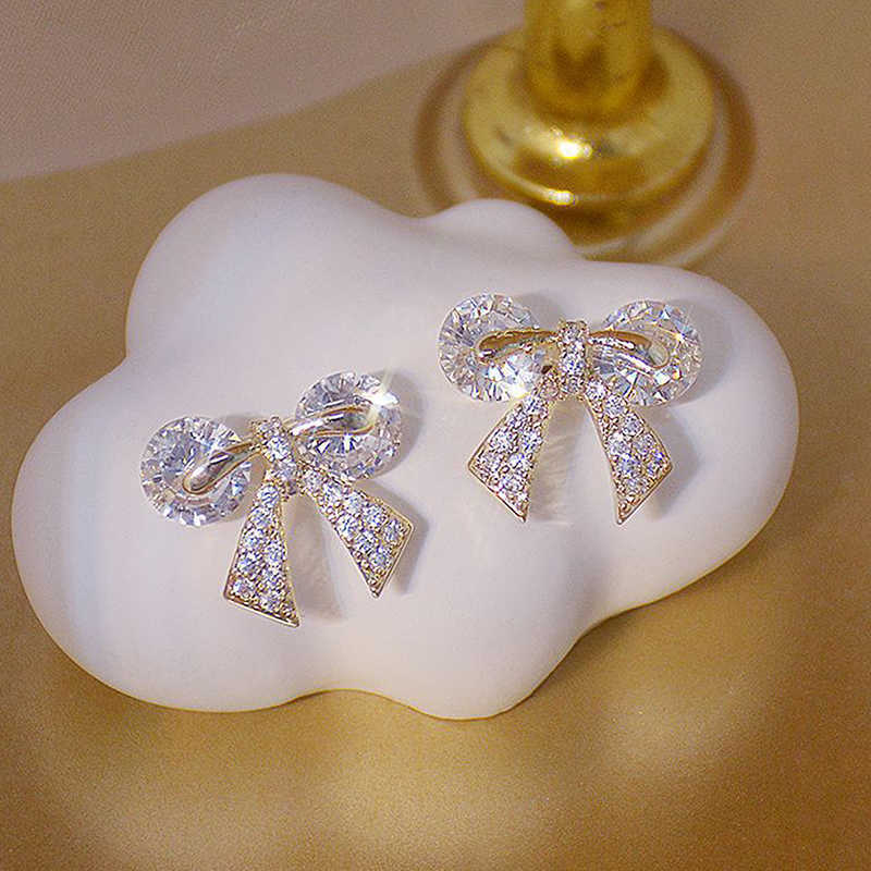 매력적인 낭만적 인 섬세한 샤인 CZ Bow Knot Earrings Pave Inlaid AAA 지르콘 스터드 이어링 보석 펜던트 액세서리 현재 G230307