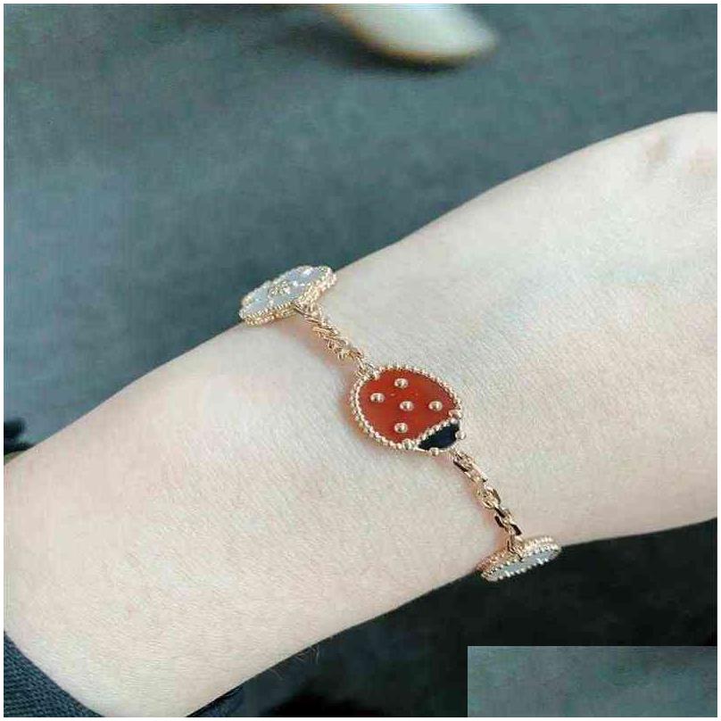 Charm Armband Fanjia Four Leaf Clover Armband Single Flower Love Butterfly Rose Gold Chain223b Drop Leverans smycken Dhoyx