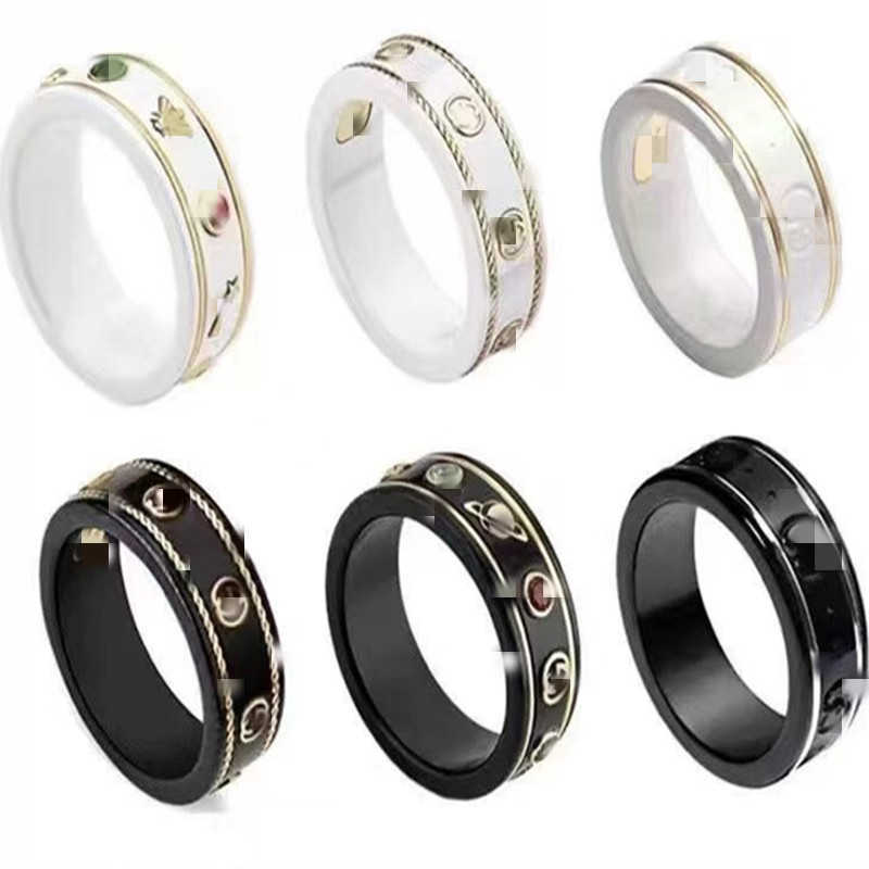 60% OFF 2023 New Luxury High Quality Fashion Jewelry for Black and White Ceramic Fried Dough Twists Gold Double Sided Couple Ring