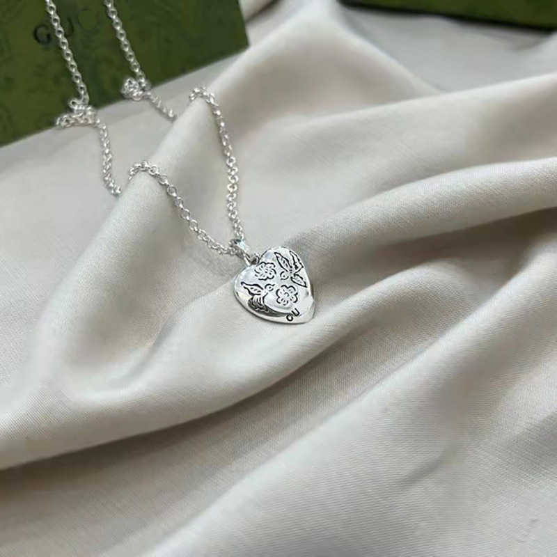 70% DI SCONTO 2023 Nuovi gioielli di moda di lusso di alta qualità la collana di amore del fiore d'argento dell'uccello degli amanti maschili e femminili cuore fatto di vecchi accessori della catena del maglione