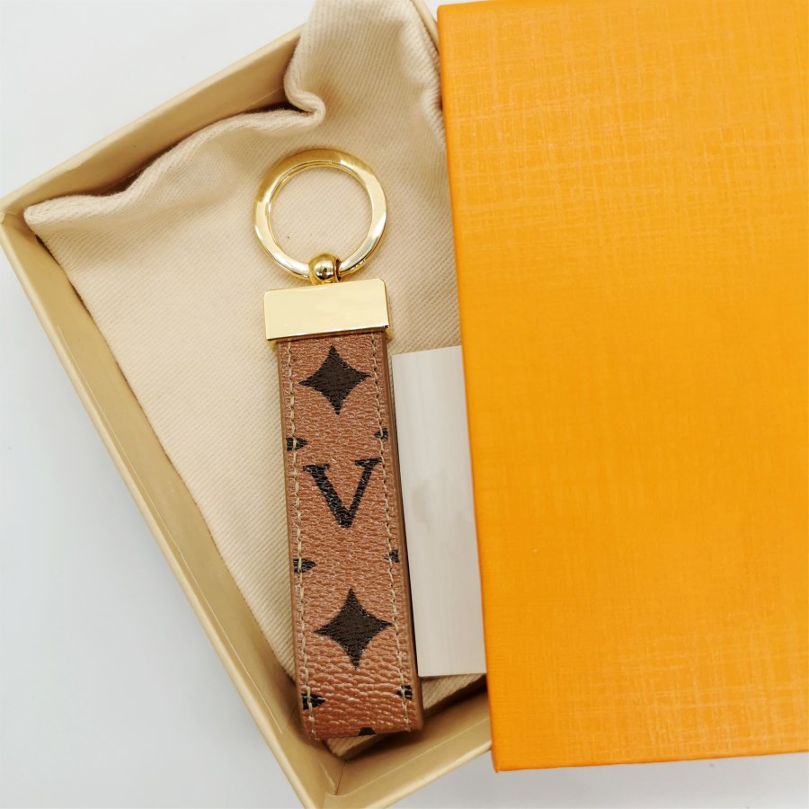 Дизайнерский брелок для ключей Брелки для ключей Кольцо Держатель Брендовые дизайнерские брелки для Porte Clef Gift Мужчины Женщины Автомобильная сумка Подвеска Аксессуары с коробкой