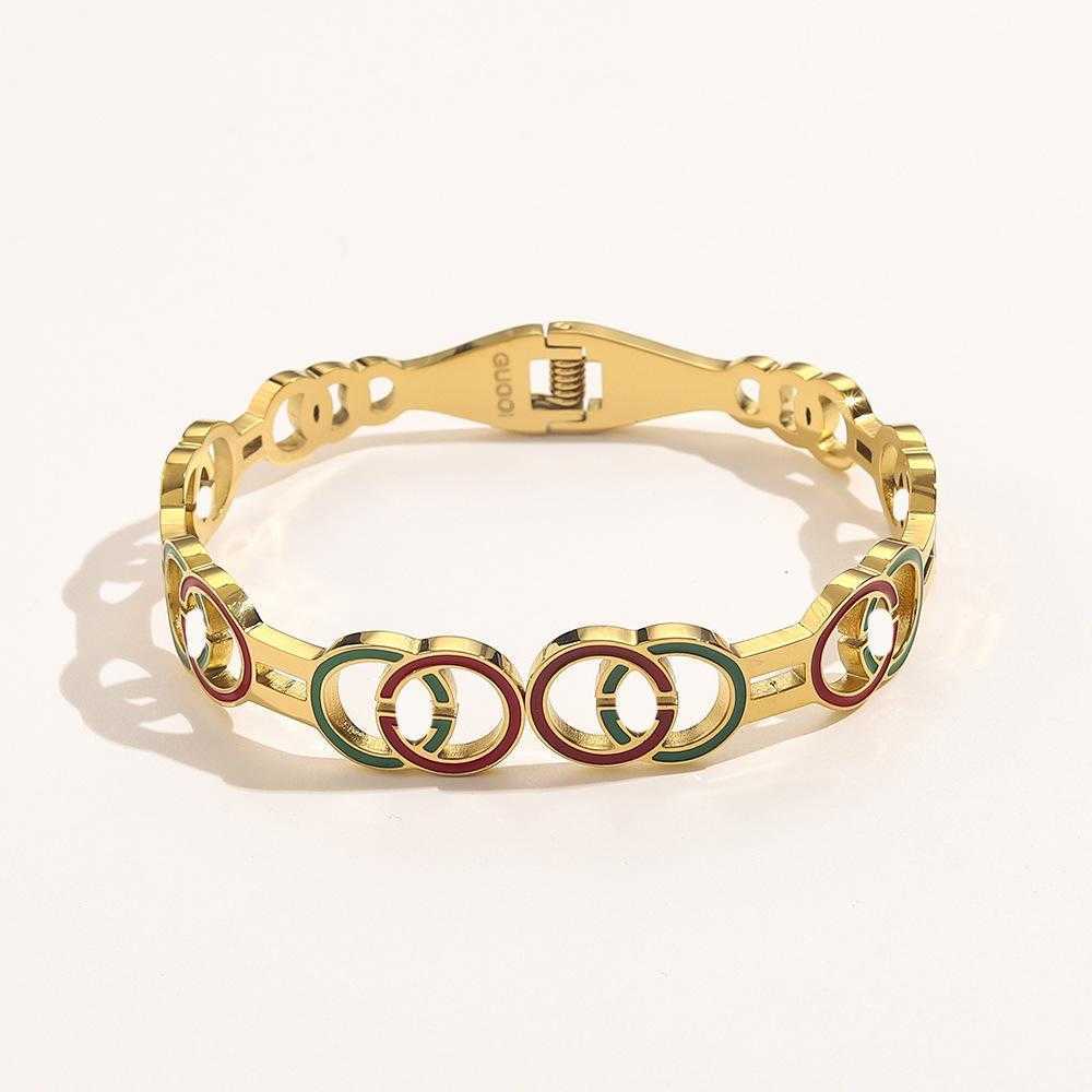 Design di gioielli di lusso Bracciale con chiusura a molla in acciaio inossidabile rosso smalto verde cavo in titanio femminile