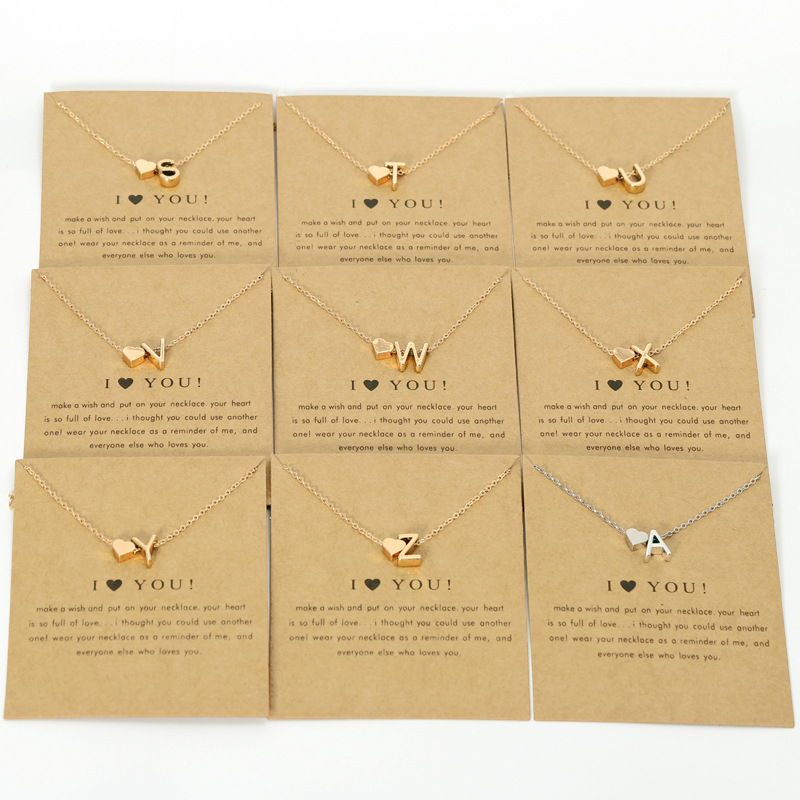 Bulkprijs liefde 26 letters hanger kettingen dames perzik hoor gouden zilveren sleutelbeen ketting ketting met gif -kaart