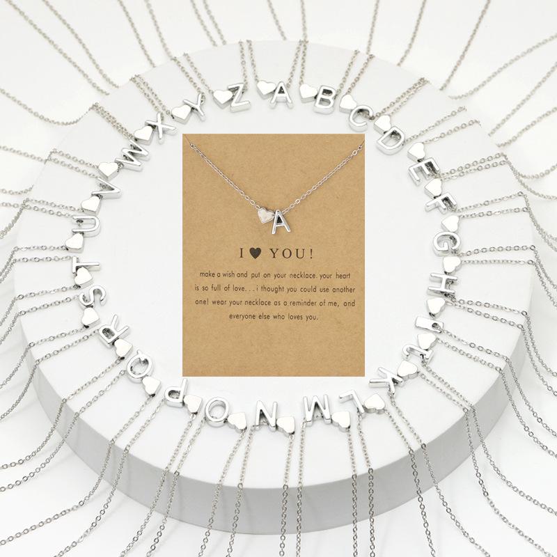 Bulkprijs liefde 26 letters hanger kettingen dames perzik hoor gouden zilveren sleutelbeen ketting ketting met gif -kaart