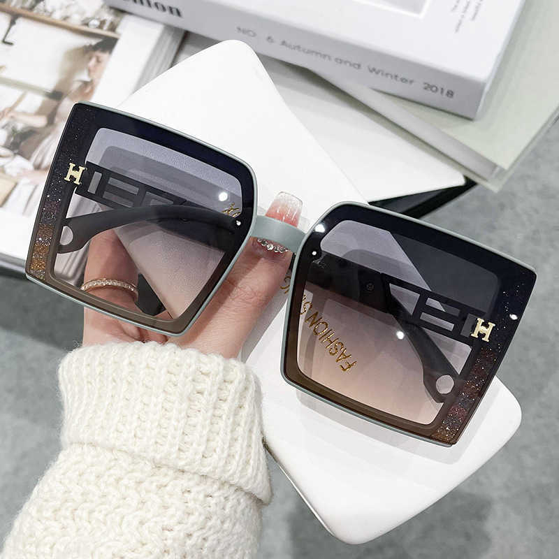 2024 Luxury Designer OFF Luxury Designer New Men's and Women's Sunglasses Off letter hollowed-out mirror leg large frame female gradient color same street photo ins