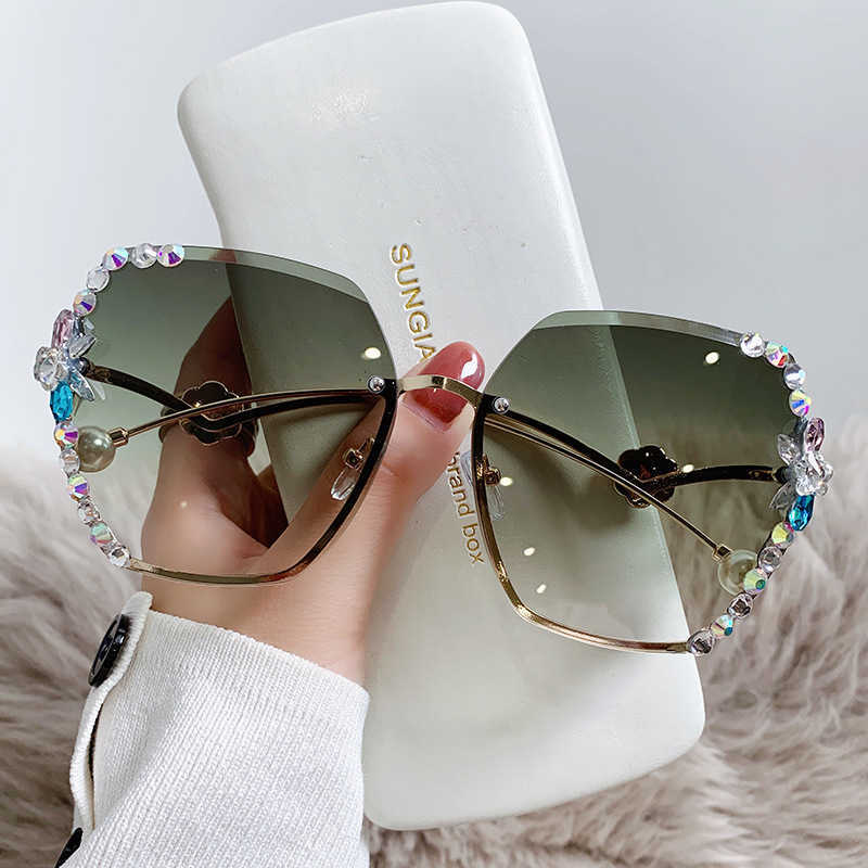 2024 Off luksusowy projektant Nowe okulary przeciwsłoneczne dla mężczyzn i kobiet z Pearl Rhinestone Sun Ultraviolet Protect