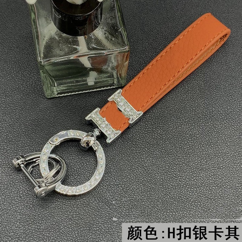 Designer Auto Key Ring Pendant Keychain-riem Hoogwaardige Lychee Patroon Lederen Key Tas Licht Luxe ingelegde diamanten gespelde sleutelring Hangende ornamenten