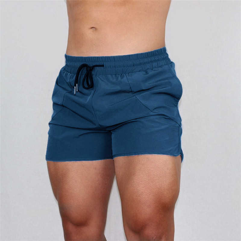 Mäns shorts 2023 Ny gymnastikkörning Shorts Men Sport Fitness Dry Fit Short Pants Male Tennis Basketball Soccer Sport Training Shorts W0320