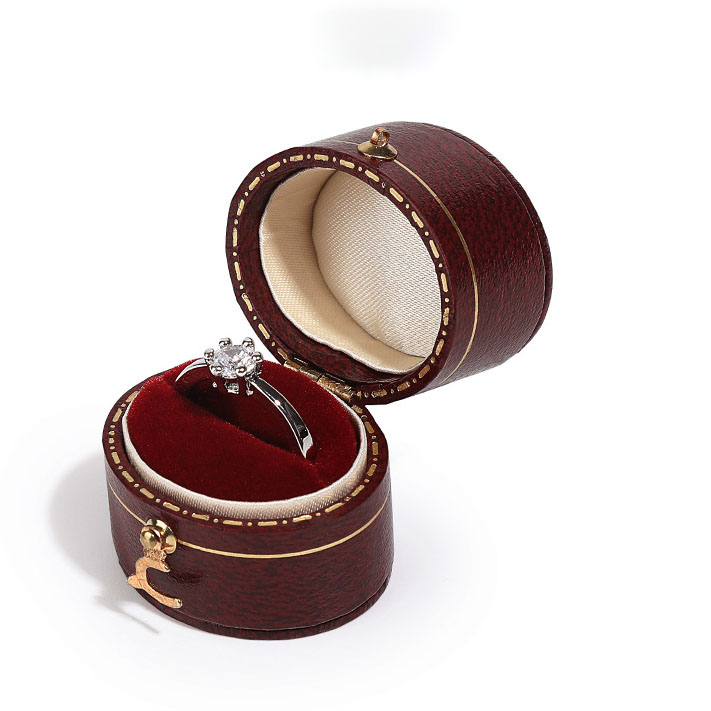 Boîte d'emballage de bague cadeau personnalisée en cuir PU de luxe boîte à bijoux octogone personnalisée boîte à bague en forme de coeur avec logo