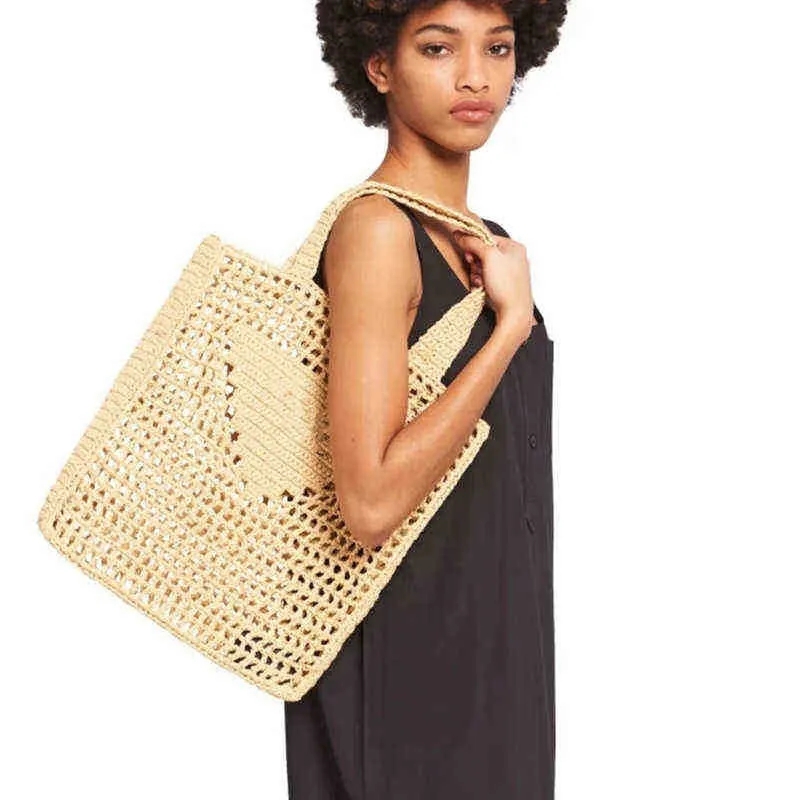 Modebrief P Mesh Hollow gewebte Einkaufstaschen Hausdekor für Sommerstrohtasche Schulter Beach Bag Eine Schulter -Prad -Portable -Einkaufstaschen für Frauen