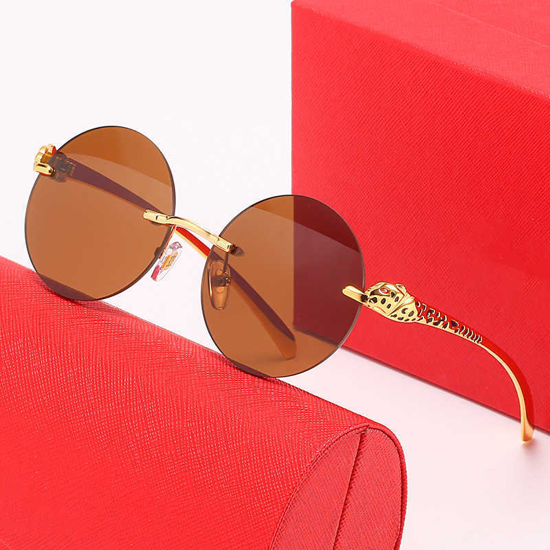Hoogwaardige modieuze zonnebrillen Men's Luxe Designer Dames Zonnebril Randloze Ronde Decoratieve luipaard Kop Mirror Personaliseerde Trend -bril