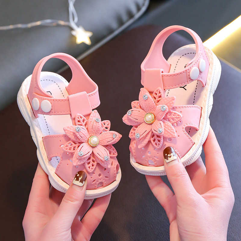 Sandalen Sweet Princess Sandals 2022 Nieuwe zomer Kinderen mode bedekte tenen zachte meid roze bloemen kinderen snap knop plat casual niet-slip w0327