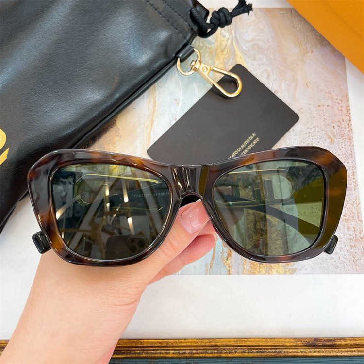 Nya designer solglasögon mäns lyxdesigner kvinnors solglasögon F's Cat's Eye Metal ins samma typ av platta netröd live