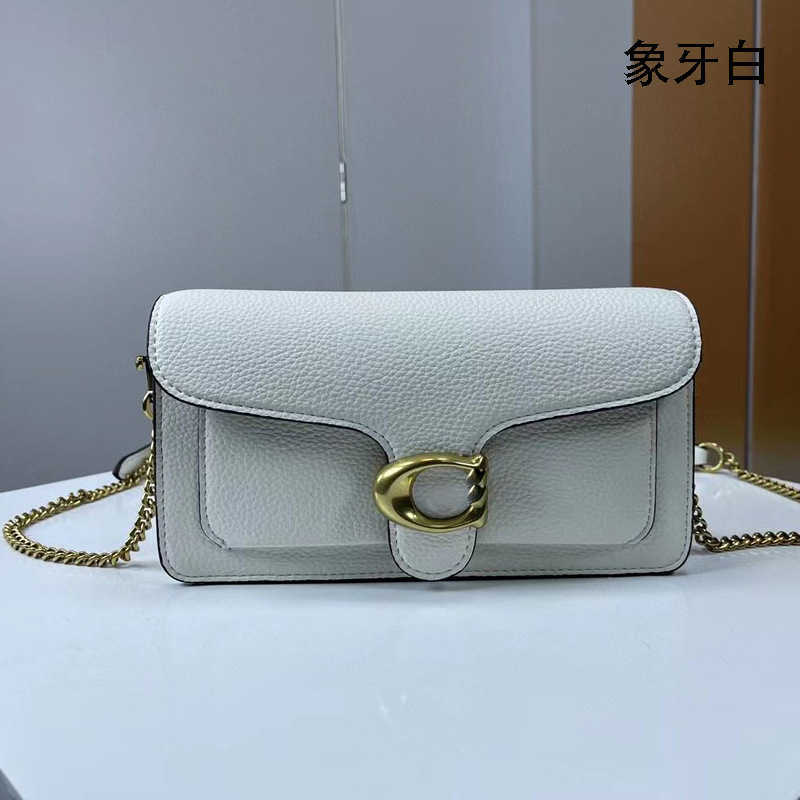 Marca de luxo bolsa de ombro 2023 novo botão magnético bacchus flap couro um ombro straddle handheld envelope axilas bolsa feminina high end