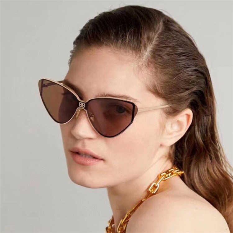 High quality fashionable sunglasses 10% OFF Luxury Designer New Men's and Women's Sunglasses 20% Off ins cat's eye Metal resistant net Red