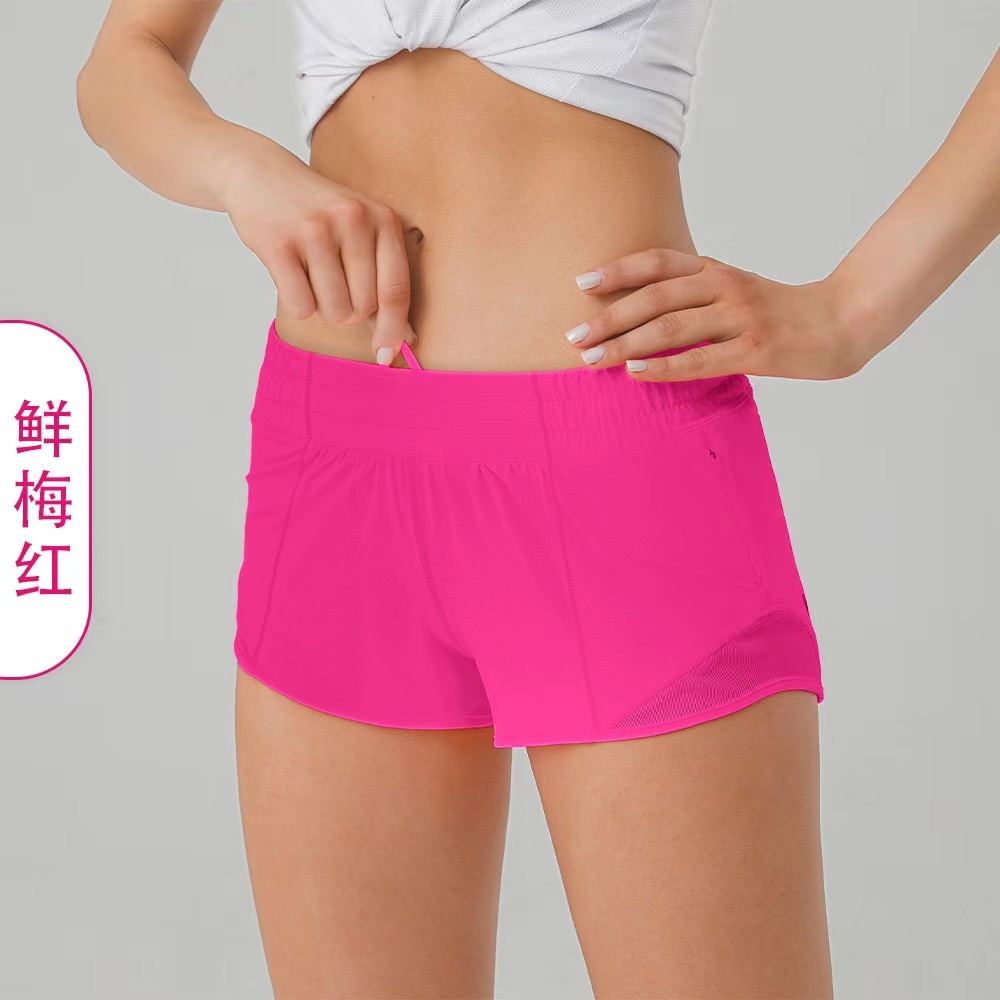 L-091 Short taille basse chaud Short de yoga respirant à séchage rapide Short de sport doublé intégré Poches latérales à fermeture éclair dissimulée Pantalon de survêtement de course avec cordon de serrage continu