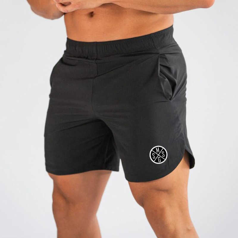 Shorts pour hommes Muscleguys hommes coupe ajustée Joggers pantalon court musculation Fitness hommes Shorts d'entraînement pantalons de survêtement séchage rapide gymnases Shorts W0327