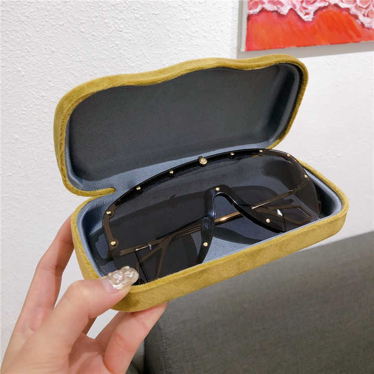 New luxury designer G family's new fashionable personalized rivet eye protection Zhou same sunglasses GG0667S