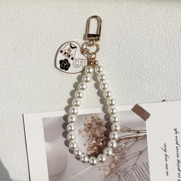 Porte-clés en chaîne de perles pour filles et femmes, 4 styles, pendentif de sac à main, décoration, accessoires de mode, vente en gros