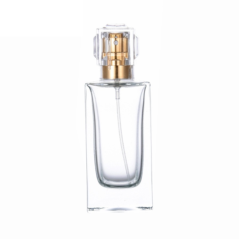 Bouteille en verre de parfum carré clair 30 ml 50 ml emballage or argent pompe de presse spary avec couvercle conteneur portable emballage rechargeable cosmétique