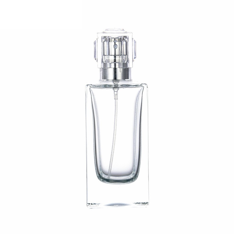 Bouteille en verre de parfum carré clair 30 ml 50 ml emballage or argent pompe de presse spary avec couvercle conteneur portable emballage rechargeable cosmétique