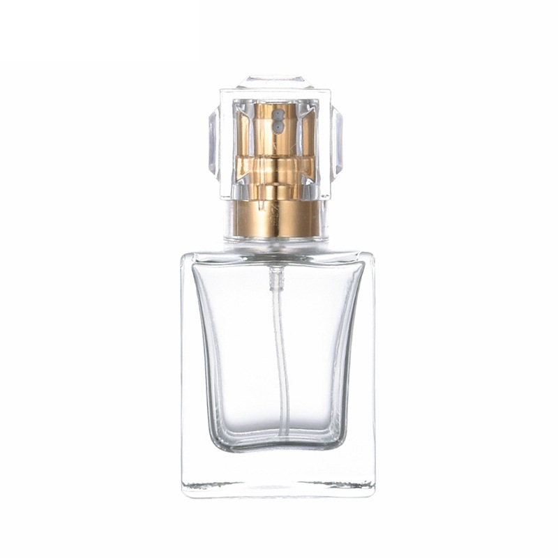 Bouteille en verre de parfum carré clair 30 ml 50 ml emballage or argent pompe de presse spary avec couvercle conteneur portable emballage rechargeable cosmétique