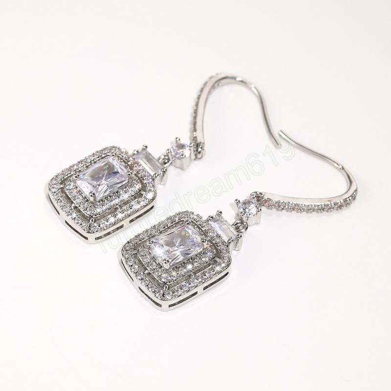 Mode de luxe princesse coupe blanc zircon cubique goutte boucles d'oreilles pour les femmes Banquet fête bijoux