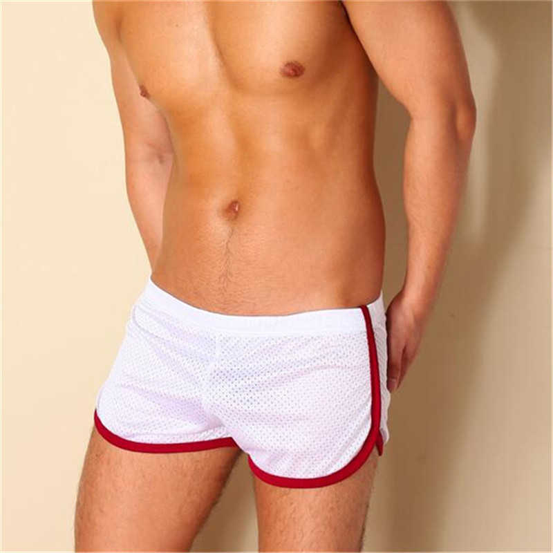 Shorts masculinos largam os shorts shorts shorts flecunts masculinos shorts esportivos ginásios de boxers soltos respiráveis ​​calças casuais curtas verão w0327