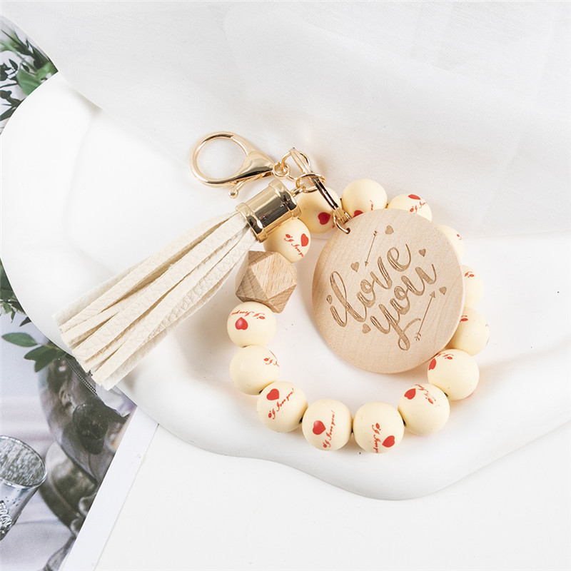 Moda Heart Flower Silicon Beads Tassel Keychain Letter Wood Letra de Bracelete de Disco de Madeira Chavejando para Mulheres Presentes de Joias de Meninas