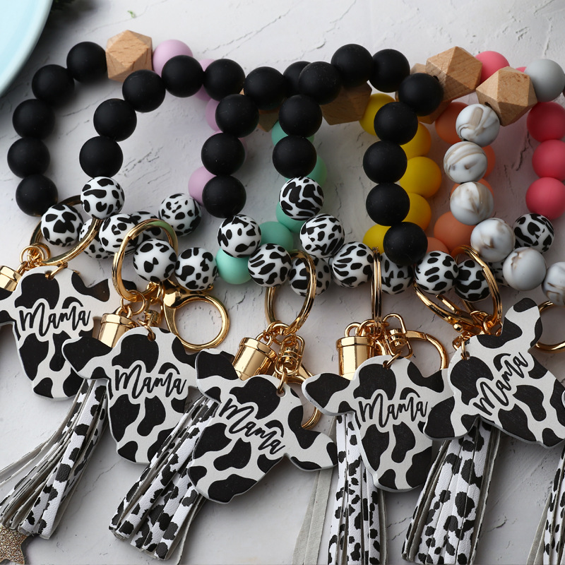 Fashion Silicone Cursive Cow Bead Bracelet Wood Disk Bracelet Keychain Cow Tassel Ox Head Wrist Key Ring Charm Pendant Accessory FY3450 tt0331