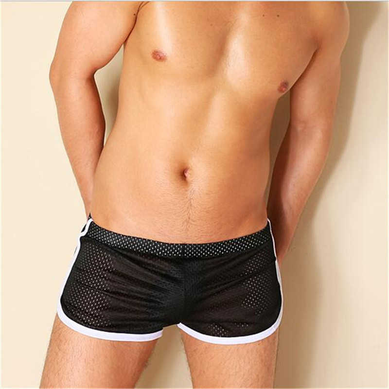 Shorts masculinos largam os shorts shorts shorts flecunts masculinos shorts esportivos ginásios de boxers soltos respiráveis ​​calças casuais curtas verão w0327