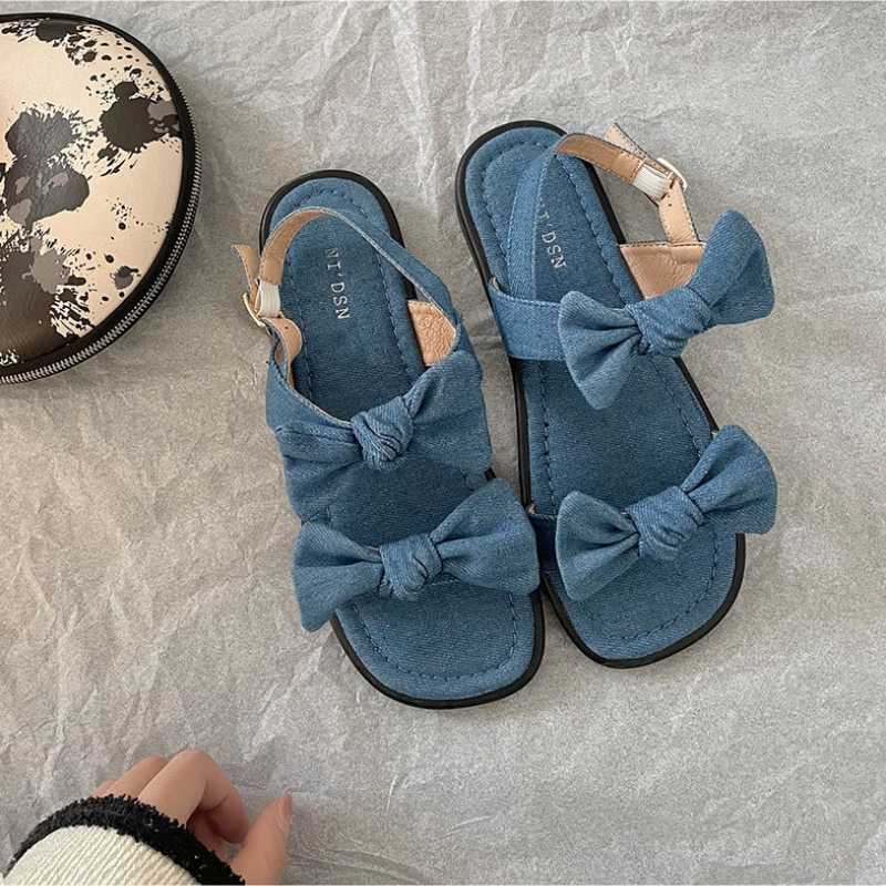 Sandaler Retro Roman Sandaler Women 2023 Ladies Summer New Bow Tie Comfy Flat Sandals With Kirt Fairy Style Lady Sandals AA230502