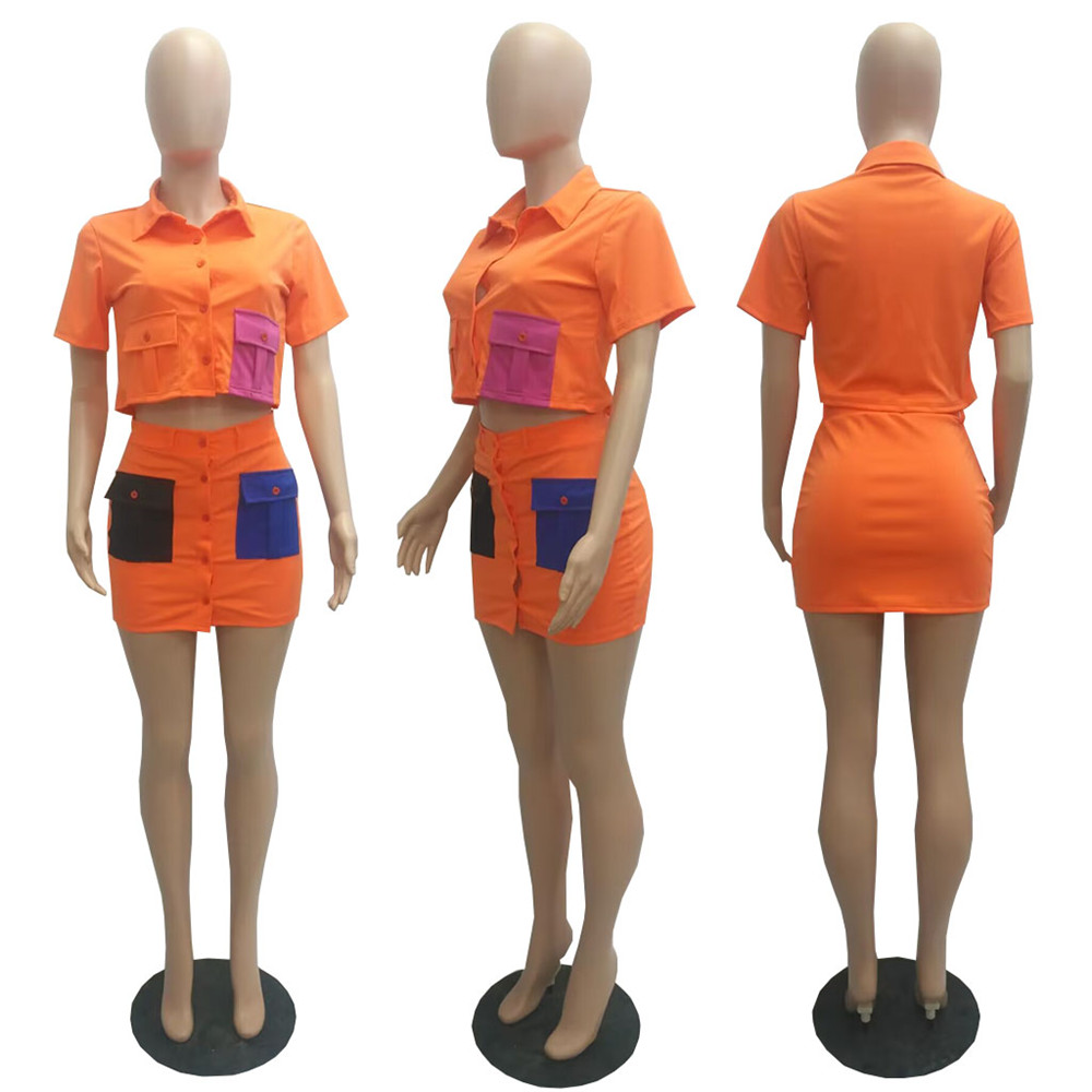女性用の新しいデザイナーサマードレスセット半袖ジャケットとミニスカート2ピースセットカジュアルポケットスカートスーツストリートウェアバルク卸売服9819