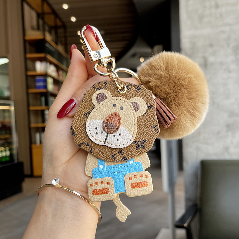 Keychain Designer Key Chain Bolsa de luxo charme Mulheres fofas LIVEN LION LION Classic Floral Carchain Pingente Men Fashion Cartoon Casal Chave Chave Presente Requintado Nice